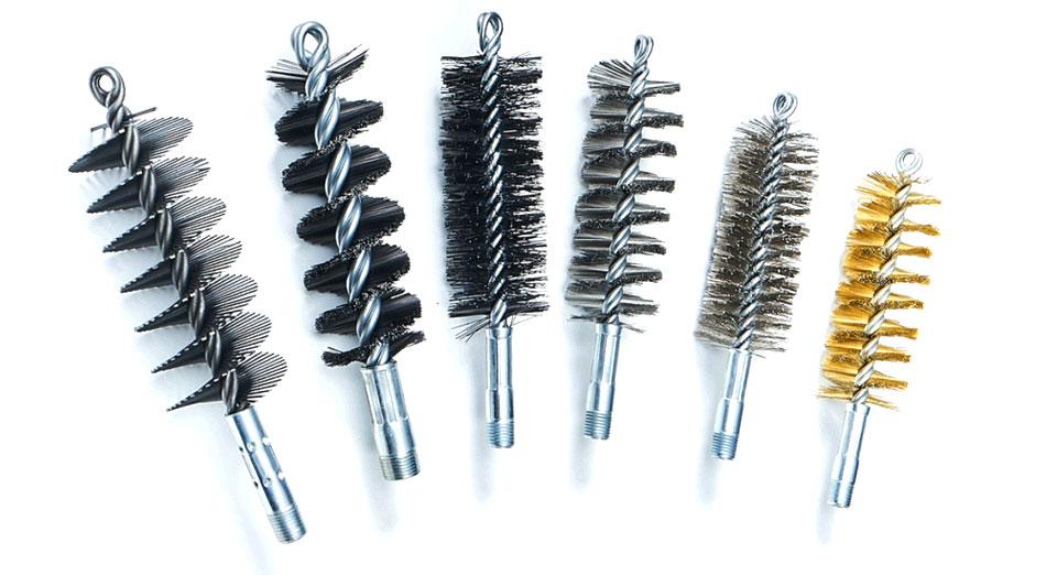 Schaefer Brush's photograph of an assortment of industrial brushes and brush systems